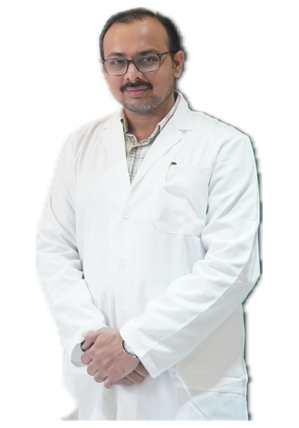 Dr. Jaydipsinh B. Bhati wearing a white coat and glasses.
